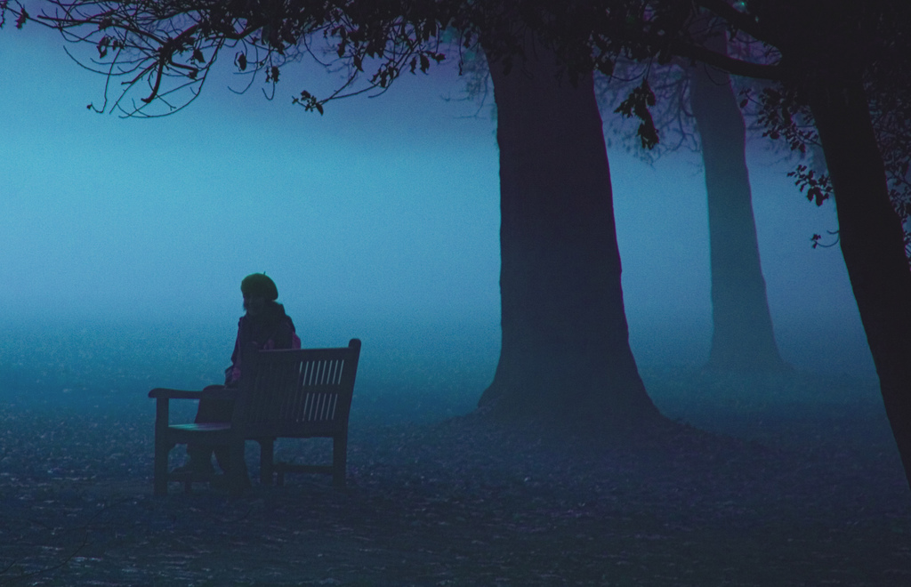person sitting in fog